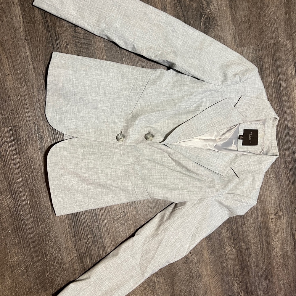 The limited gray suit jacket size 0